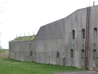 De gang naar de westelijke hefkoepel aan het bomvrije hoofdgebouw van het Fort bij Spijkerboor, dat werd gebruikt bij de ontsnapping.
